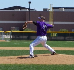John Moulchin throws the first pitch of the 2011 season against the Grays at Jacobs High School varsity field.