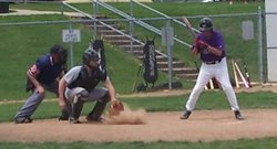 Darryl Eanos looks at a pitch in the dirt in his first plate appearance since June 2013.