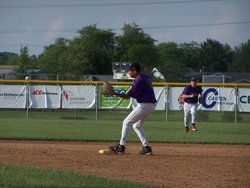 Second baseman Darryl Eanos prepares to take a throw for a force out while center fielder Rich Skibski backs up the play.