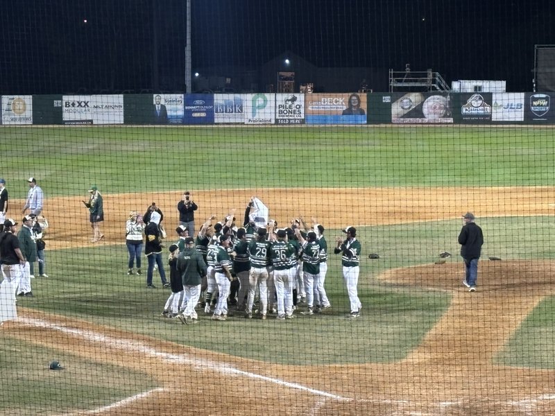 Islanders celebrate following final out in Regina