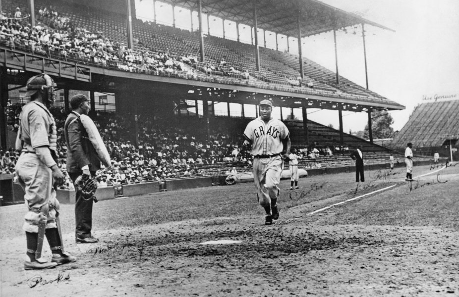 Josh Gibson crosses home plate after homerun