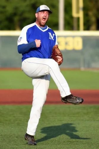 Beecher Muskies closer Corey Schultz celebrates immediately after the Muskies’ 7-5 win against the New Lenox Pumas in the NABF World Series semi final
