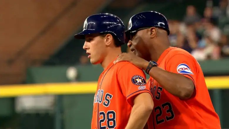 Crete-Monee graduate and former Beecher Muskie Lucas Spence (with Houston first-base coach Dave Clark) made his MLB debut on July 17. MLB.com photo