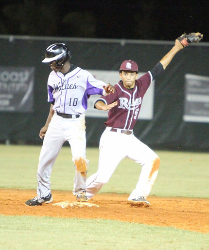 Riverview shortstop Trent Sinkfield makes a play against Timber Creek in the first inning of Tuesday's Class 8A-Region 2 final at the Rams new field. STAFF PHOTO / DENNIS MAFFEZZOLI
