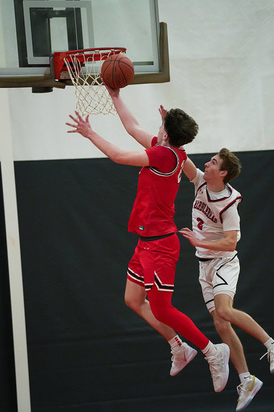 Jamason Vella drives to the basket for two.