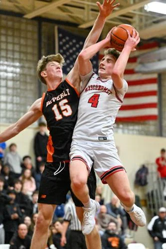 Jimmy Farrell goes strong to the basket