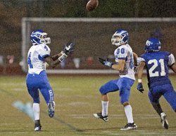 If Federal Way's Mike Tate, left, and company get loose, they may run away with the SPSL South crown. 