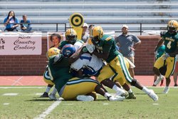 Spring Valley defenders take down Aloyisus Jackson during their game against Richland Northeast.  C. Rush  - Special to The State 