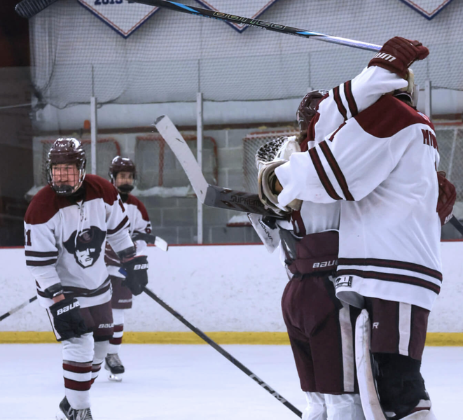 Senior Trevor Bailey congratulates Jason Swaim