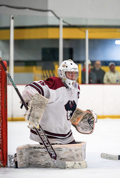 Concord-Carlisle goaltender Sam Griswold keeps his