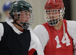 Hayden Haldane of Shenendehowa, left, and Evan Maloney of Niskayuna talk during a break in practice at the Clifton Park Ice Arena last Wesnesday.