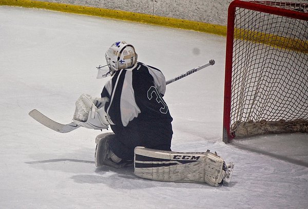 Jacob Tinson makes a save in an 8-5 victory over Wethersfield