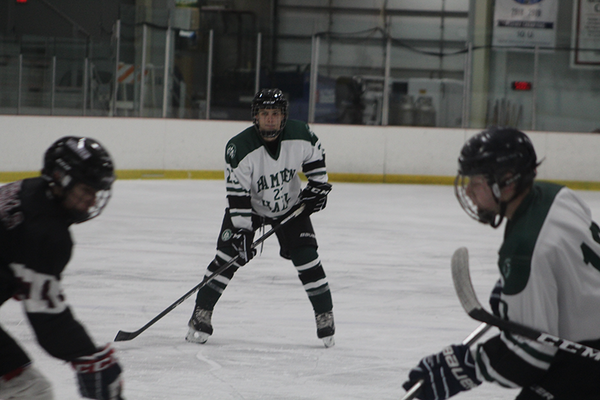 Devin Anderson waits at the point for a shot on net.