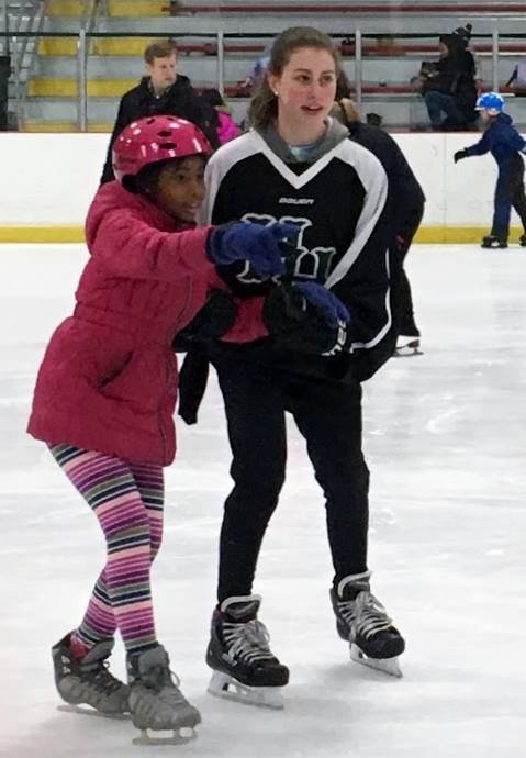 Hamden Hall Goalie KateLyn DeSa assists skater