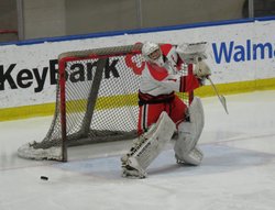 Niagara-Wheatfield goalie Peyton Siegmann passes t