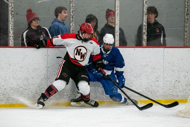 Niagara Wheatfield’s Josha Kaczor (left) battles G