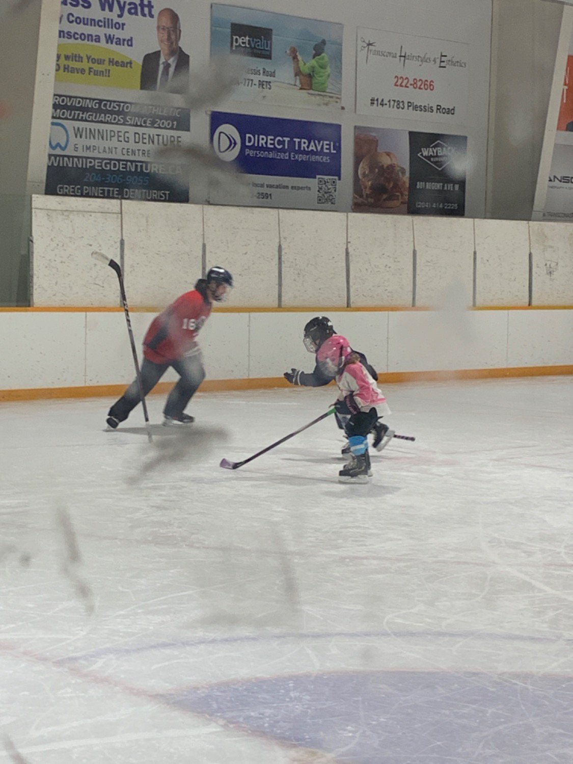 Express playing games with minor hockey kids