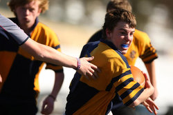 AJ runs the ball through SWARM defenders