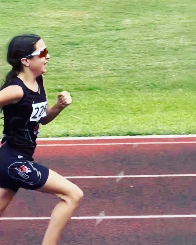 Mia takes silver hitting a PR of 1:12:34. 400m