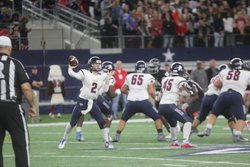 Mitchell Jonke sets to throw a pass.