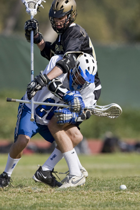 OP's No 17 Joey Carpenter takes on Cate offensman, causing 1 of his 5 turnovers.