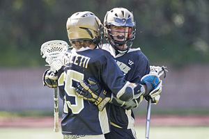 No.35 Grant Consoletti congratulates No.7 Tommy Evans after 1 of 4 scores
