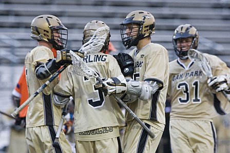 Evans, Darling, Goehring and Phillps celebrate after 1 of their combined 10 goals.