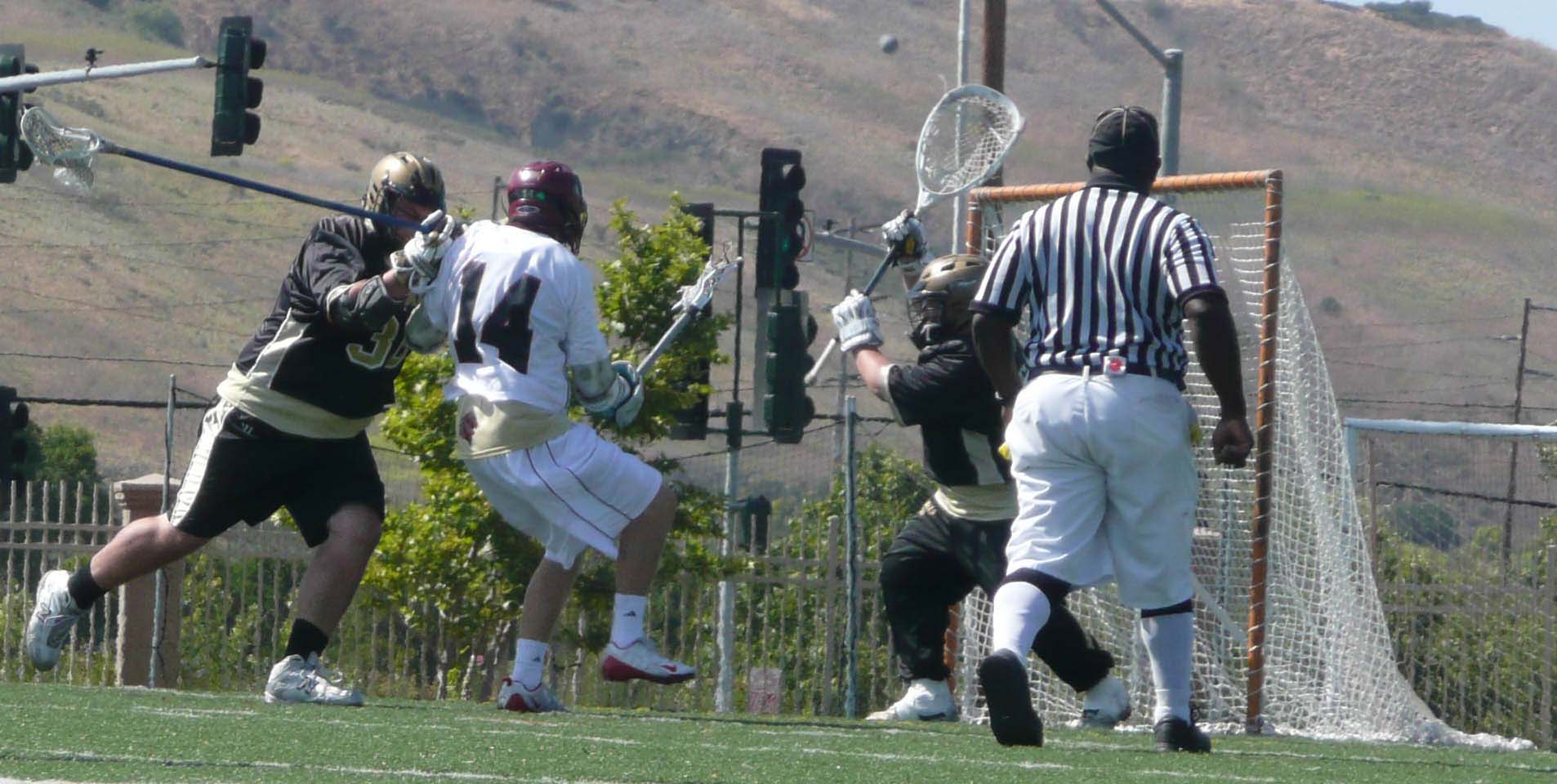Connor Phillips and Max Luchs team up to stop           J Serra attackman (photo by Owen Consoletti)