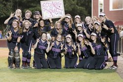 Lambert softball players pose for pictures after their sweep of Brookwood on Wednesday in the second round of the Class 7A state playoffs.